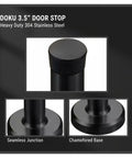 Set Of 10 Black 3.7 Inch Door Stops With Stainless Steel Body And Rubber Bumper, close-up of chamfered base and rubber top