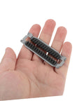 Automatic Tape Cutter Guide Plate Replacement For Metal Tape Machines Easy Install Spare Part For Warehouse And Packaging Prevents Jams Pro Grade Boosts Packing Line Productivity And Workflow, small gray plastic part in hand
