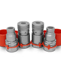 Front view of four Summit Hydraulics 3/4 in SAE skid-steer quick-connect couplers with red protective caps