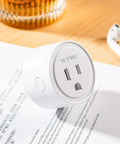 Single smart plug on wooden table, part of 4 Pack Smart Plugs For Alexa And Google Home Compatibility No Hub Required Remote Control Scheduling Timers ETL Certified Ideal For Smart Home Automation