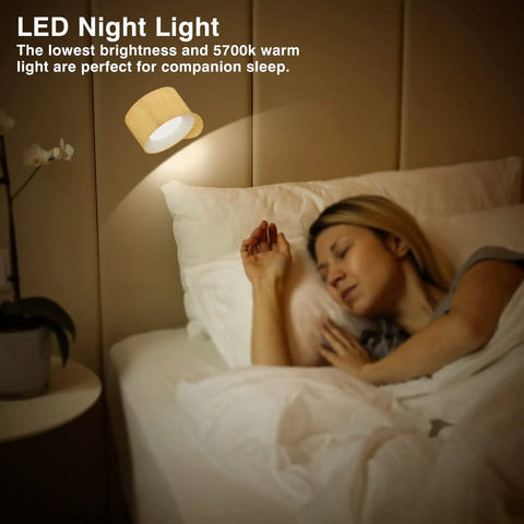 LED Sconce Wall Lamps Cordless Rechargeable Battery Powered with USB Port illuminating a woman sleeping in bed