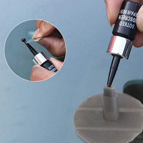 Close-up of Fix Cracks Fast With Nano Glass Repair Kit For Windshields And Glass Chips Scratches being used on glass surface