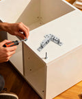 Healeep 10PCS Copper Door Catch With Silent Close Function For Kitchen Cabinets installation, screws and latch shown on cabinet.