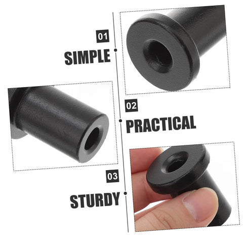 Close-up of Sliding Barn Door Track Spacers And Wall Stopper Kit for Easy Installation showing black metal spacer in hand.