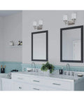 Alexa Collection 2 Light Bath Vanity Light with Dope Etched Linen Glass and Brushed Nickel Finish above bathroom mirrors.