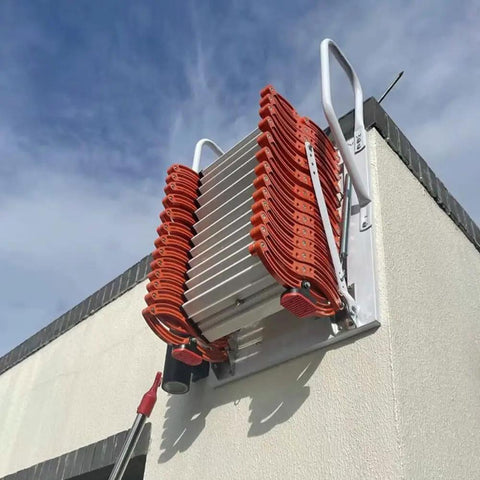 Electric Attic Stairs With Remote Control Wall Mounted Retractable Step Ladder Built Like A Tank Non Slip Pedals mounted on wall.
