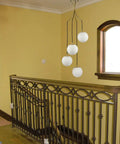 Dope Mid Century Modern Pendant Lighting Four Light Globe Chandeliers With White Opal Glass Shades And Brass Finish for stairway