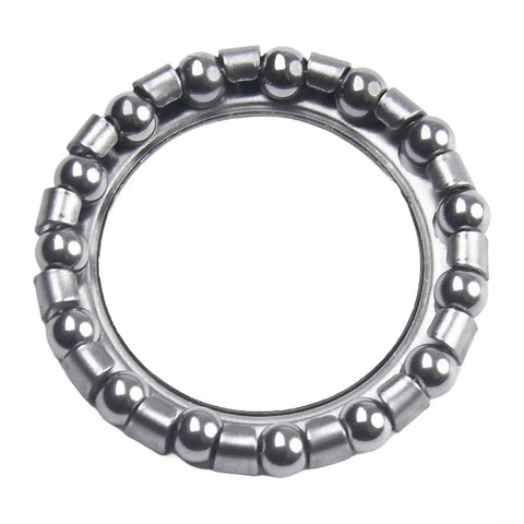 Close-up of Steering Headset Ball Bearings Set Of 4 For Electric Bikes, Durable Steel Construction, 1.57 Inch Inner By 1.06 Inch Outer Diameter.