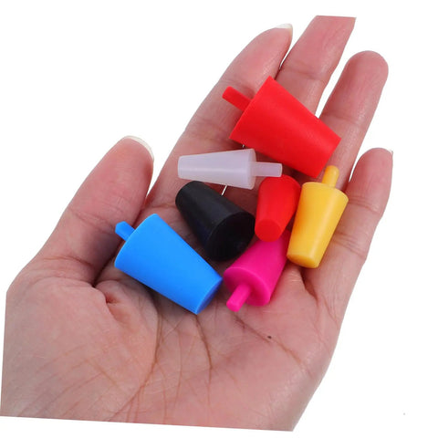 Gleavi 35 Piece Silicone Tapered Plugs Kit Seals Tubes Perfect For Spray Painting, Anodizing, And Powder Coating To Keep Debris Out During Industrial Jobs. Assorted silicone tapered plugs in hand