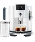 Top Tier Automatic Espresso Machine Bundle In Piano White With Glass Milk Container And Clearyl Smart Filter Cartridge, front view with two cups.