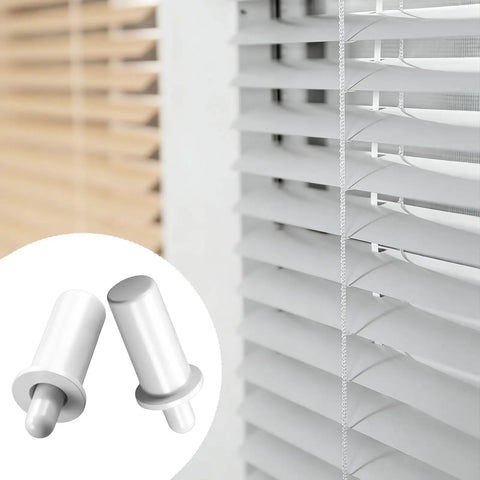 Heavy Duty Spring Loaded Plantation Shutter Pin Repair Kit 50 Pack, white plastic pins next to Venetian blinds.