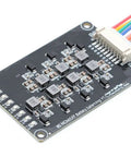 Close-up of 8S 24V 25.6V LiFePO4 Battery BMS Active Balancer Board 1.2A, featuring circuitry and connections.