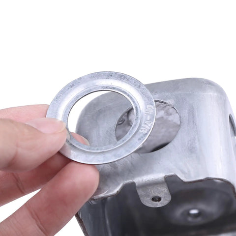 80 Piece Rigid Conduit Reducing Washer Kit For Electrical Boxes With 3/4 To 1/2, 1 To 3/4, And 1 To 1/2 Knockout Reducers, Zinc Plated Steel Assortment For Quick Box Openings And Slick, Flexible Wiring Projects. Zinc plated steel reducing washer shown by hand on electrical box knockout