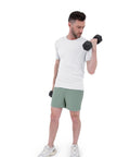 Man wearing 2 In 1 Running Shorts With Built In Liner For Men, 5 Inch Inseam, Woven Stretch Quick Dry Fabric, Hedge Green during workout