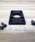 Flange Mount Kit P057339K0001 With Eight Hole Mounts For 1/4-20 Thread, black metal plate with bolts and washers shown