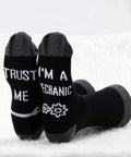 Two Pairs Mechanic Socks Gift Set With Trust Me I Am A Mechanic Phrase Unisex Crew Socks showing text and gear design, size 5-13