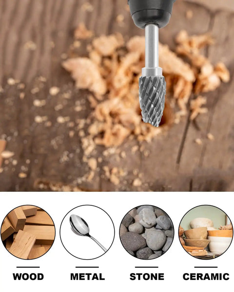 Pro Grade Tungsten Carbide Burr Set 20 Pc For Rotary Die Grinder Bits One Eighth Inch Shank Double Cut shown with wood shavings