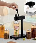 Heavy Duty Manual Can Sealer Machine For Aluminum And Plastic Cans With Adjustable Height Cup Sealers on kitchen counter with jars