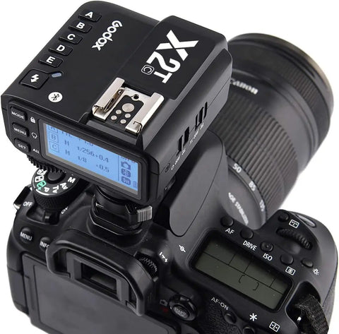 Canon TTL Wireless Flash Trigger With Bluetooth App Control on DSLR, displaying control buttons and locking hotshoe for off-camera use