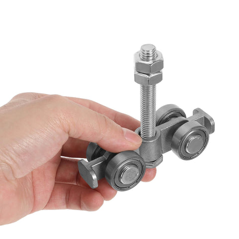 Close-up of a hand holding a Heavy Duty Sliding Door Roller Kit With Quiet Glide Wheels for barn doors and wardrobes.