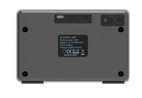 Back view of Compact Mini Electric Guitar Amp With 3.5mm Headphone Aux Input Dual 5W Speakers, ports and label visible.