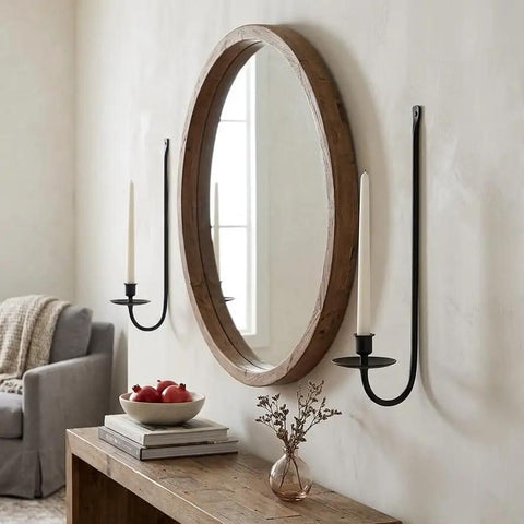 Super Rock Solid Iron Wall Candle Sconces Set Of Two Matte Black Metal Hanging Mount beside round mirror in farmhouse decor.