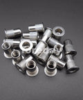 Badass M5 Rivet Insert Clinch Nuts Premium 304 Stainless Steel Flat Head Knurled Blind Hardware Locking Fasteners 20 Piece Pack on dark surface.