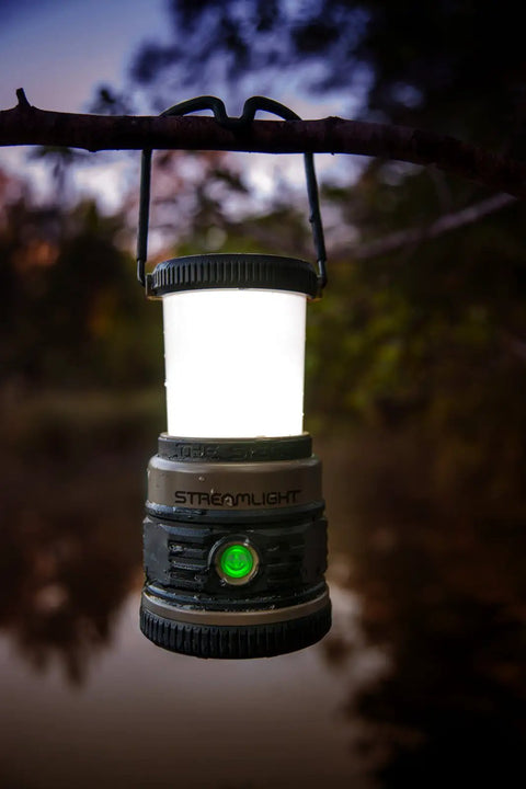 Siege 540 Lumen Compact LED Camping Lantern With 360 Degree Lighting And Red SOS Mode hanging from a branch
