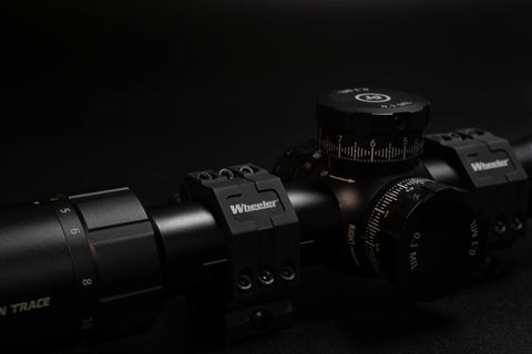 Hella Secure 2 Piece Picatinny Scope Rings With Built In Anti Cant Leveling Dial And Flat Top Base on scope, showcasing precision engineering.
