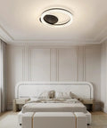 White Finish Modern Flush Mount Circle Ring LED Ceiling Light With Three Color Temperature Settings For Living Room Bedroom And Restaurant Acrylic Ring Fixture Sleek Yet Bright Ambience installed in a modern bedroom