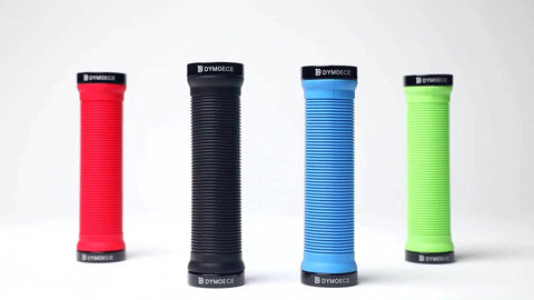 Four colorful bike handlebar grips, including Bike Handlebar Grips Dual Lock-On Clamps, Grippy Ergonomic Rubber and Aluminum Alloy MTB BMX Downhill Grip, Comfortable Non Slip Bar End Locks, Reduces Fatigue on Long Rides, 5.11 Inch Length, shown in red, black, blue, and green, standing upright on a white background.