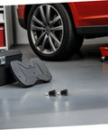 Healifty 4pcs Heavy Duty Metal Spring Pins With Universal Compatibility Provide Rock Solid Precision Positioning And Stable Rebound For Industrial Mechanical Parts And Machine Tool Locating Applications Without Any Drift on garage floor next to toolbox.