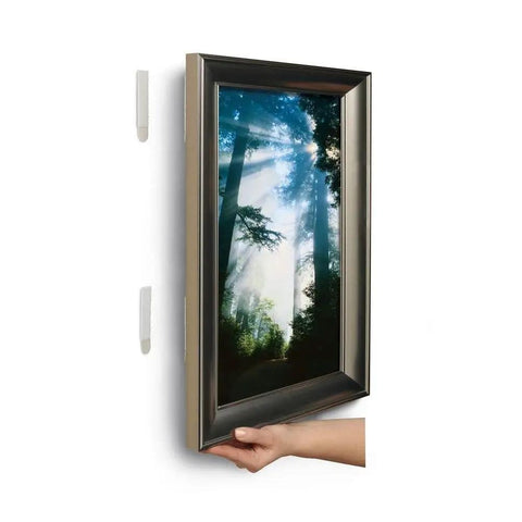 Nails Free Picture And Frame Hanging Strips Large Size 24 Pairs For 24x36 Frames with hand holding frame demonstrating one-click lock