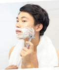 Man using Long Handle Safety Razor for Men With Butterfly Open Design, Old School Vintage Style Beard Shaver for a close shave