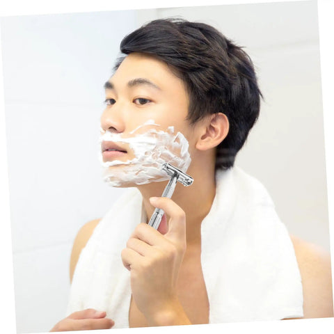 Man using Long Handle Safety Razor for Men With Butterfly Open Design, Old School Vintage Style Beard Shaver for a close shave