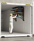 Heavy Duty Container Hanging Shelves 2 Pack No Drill Vertical Storage Racks For Building Materials And Workshop Tools Reinforced Steel Rack System. Worker using mounted shelves in container.