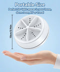 Portable Mini Ultrasonic Washing Machine For Everyday Laundry And Kitchen Prep shown in hand for size reference.
