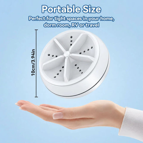Portable Mini Ultrasonic Washing Machine For Everyday Laundry And Kitchen Prep shown in hand for size reference.