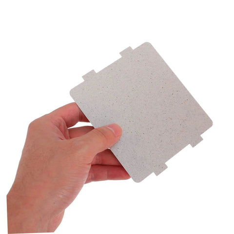 Hand holding Microwave Waveguide Cover Mica Sheet Heat Insulation Guard for High Temperature Resistance, cuttable and durable.