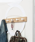 Heavy Duty Door Hanging Coat Hook Rack Total Game Changer Wall Mounted Storage Organizer For Entryway with coats and bags.