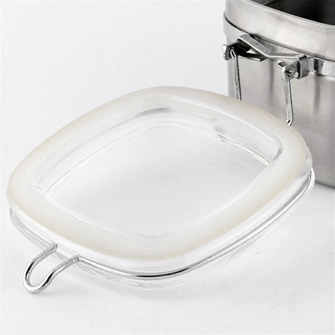 Solid Heavy Duty Stainless Steel Coffee Canister With Tight Snap Buckle And Wide Mouth Design lid close-up view for moisture protection.