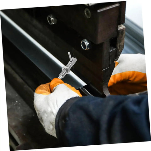 Hand using Top Shelf Stainless Steel L Handle Spring Plunger Pin Knockout Security Lock on a tool assembly line.