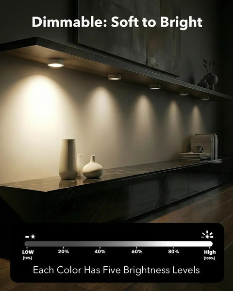Rechargeable Puck Lights With Remote Control 2400mAh USB C adjustable lighting on display shelf showing brightness levels.