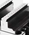 Top Tier CNC Concentric Vise With Turntable Fixture For Machining Center, self-centering clamp jaws and measuring scale close-up.