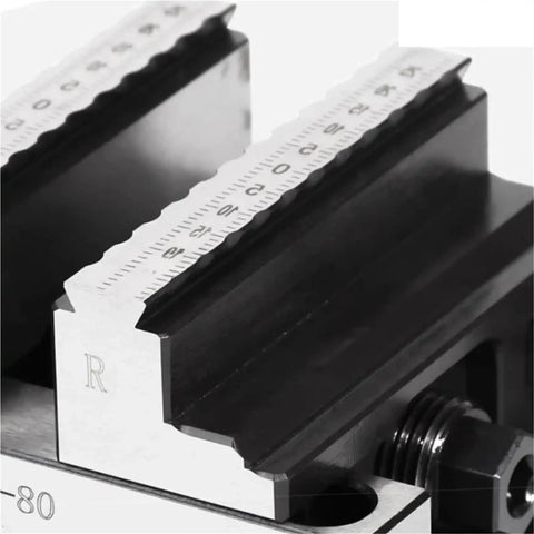 Top Tier CNC Concentric Vise With Turntable Fixture For Machining Center, self-centering clamp jaws and measuring scale close-up.