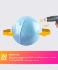 Heat gun shrinking Clear PVC Shrink Wrap Bags 4x6 Inches With Heat Seal 400 Pcs Pack on blue bath bomb with instructions.