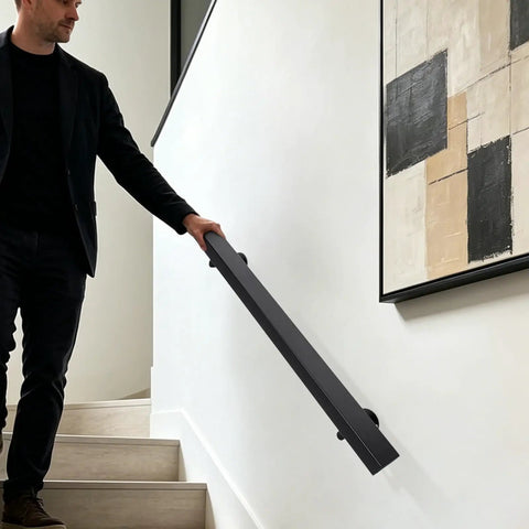 Flush Wall Mount Stair Handrail Heavy Duty Stainless Steel Safety Rail Sleek Modern Black Profile being held on stairs.