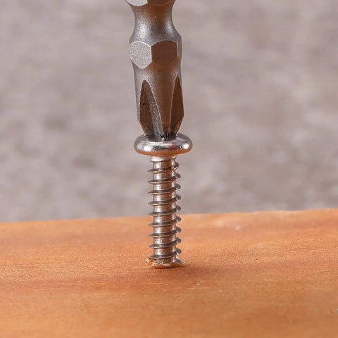 Pro Grade Number 6 X 1/2 Inch 304 Stainless Steel Wood Screws 100 Pack Pan Head Fasteners driven into wood.