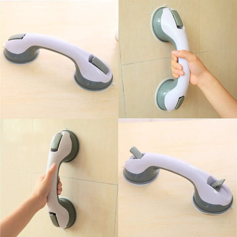 White suction grab bar with gray ends on a tile wall, easy grip handle shown in use