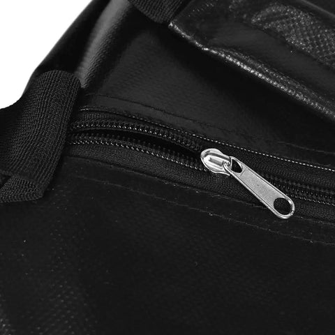 Close-up of zipper on On The Go Golf Swing Trainer Bag For Quick Practice Sessions Power Smash Target Bag in black pattern.